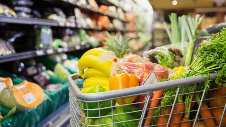 Shopping cart full of fruits and vegetables
